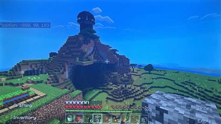 How do you spawn near a village in Minecraft PS4?