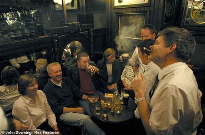 When did Michigan ban smoking indoors?
